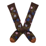 Pair of brown socks with floral patterns on a white background