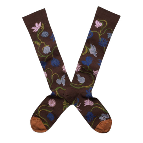 Pair of brown socks with floral patterns on a white background
