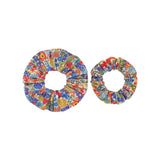 Liberty print large and small hair scrunchie on a white background.