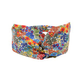 Liberty print twist headband on a white background.