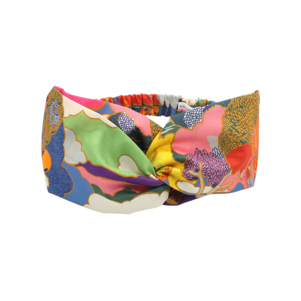 Liberty print twist headband on a white background.