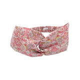 Liberty print twist headband on a white background.