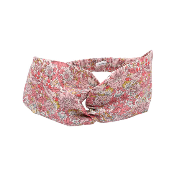 Liberty print twist headband on a white background.