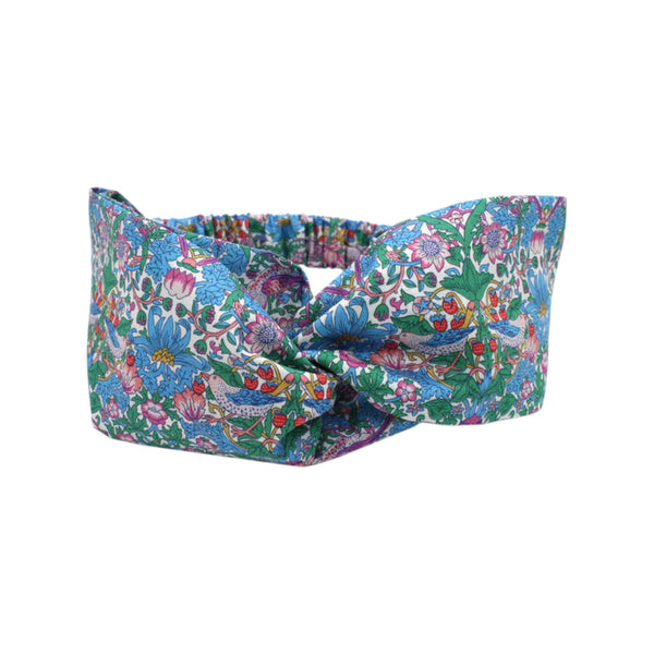 Liberty print twist headband on a white background.