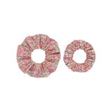 Liberty print large and small hair scrunchie on a white background.