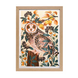 A print of an owl surrounded by branches 