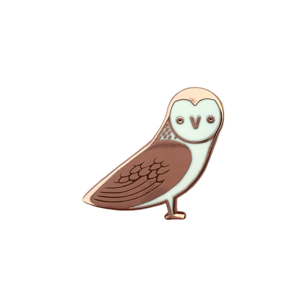 Barn owl enamel pin on a white background