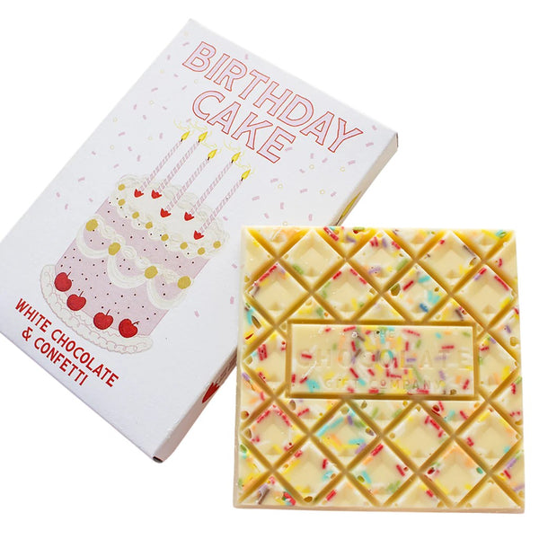 White chocolate and confetti birthday cake chocolate bar on a white background
