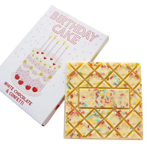 White chocolate and confetti birthday cake chocolate bar on a white background