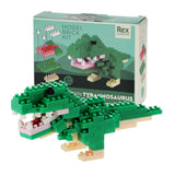 Model brick kit of a green T rex dinosaur with packaging in the background
