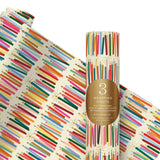 roll of wrapping paper with multicoloured candles