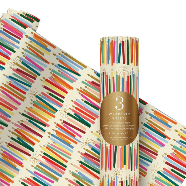 roll of wrapping paper with multicoloured candles