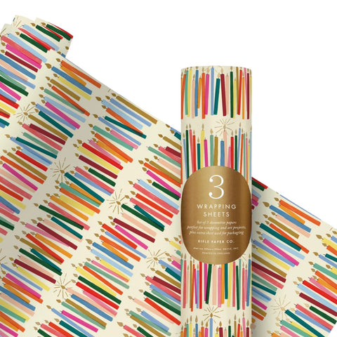 roll of wrapping paper with multicoloured candles
