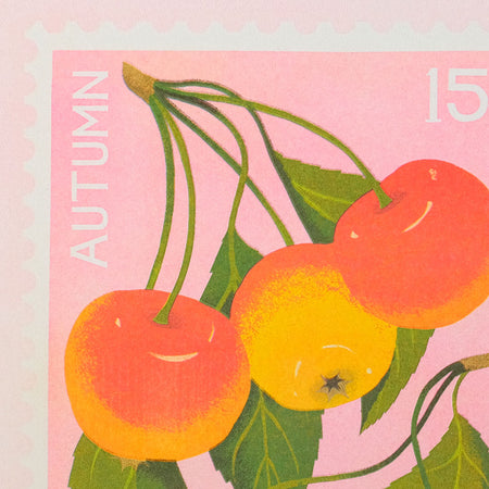 A close-up of a postage stamp featuring an autumn illustration with three red-and-yellow crab apples on green stems against a pink background, with the word AUTUMN and the number 15 visible.