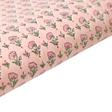 Floral patterned gift wrap with pink flowers on a light pink background
