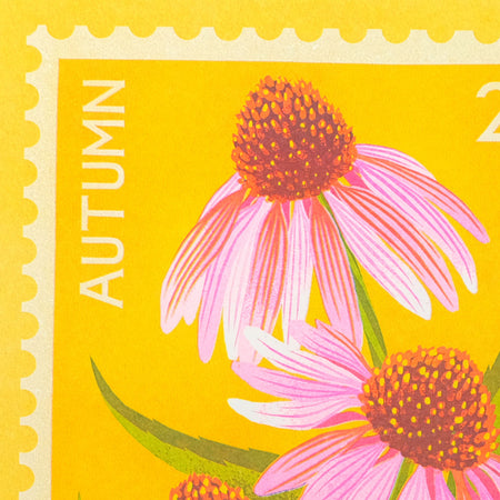 Close-up of a postage stamp design with the word AUTUMN on the left and illustrated pink flowers on a bright yellow background.