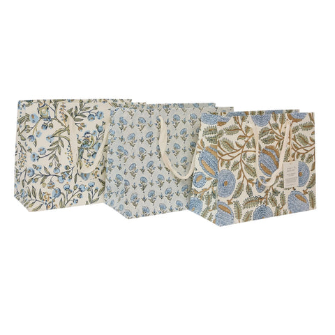 set of three block printed gift bags on a white background