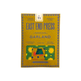 Box of East End Press Garland printed with colorful design on a white background