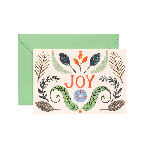 Greeting card with 'JOY' and leaf designs on a white background