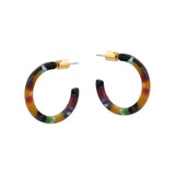 Multicolored hoop earrings with gold accents on a white background