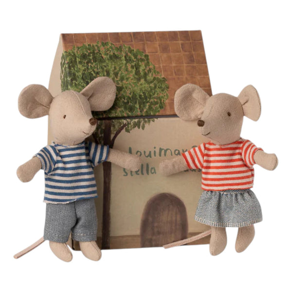 two fabric mice wearing stripy t-shirts , stood in front of their cardboard house
