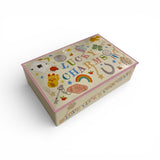 a box of tinned chocolates, on the lid of the tin it says Lucky Charms.