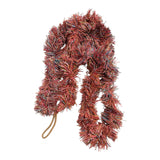 multi coloured tinsel garland on a white background