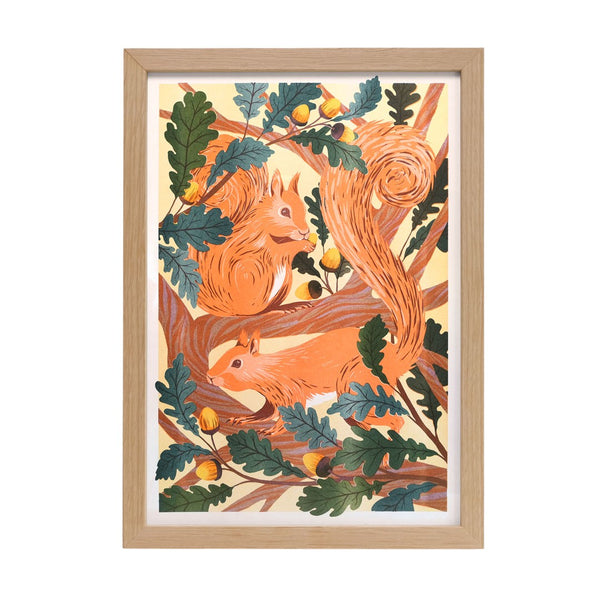 A print showing two red squirrels on a tree