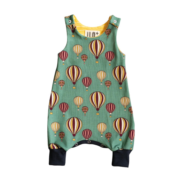 Baby romper with hot air balloon pattern on a white background