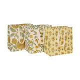 set of three gift bags set on a white background