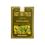 Packaging of East End Press Garland printed paper with floral design on a white background