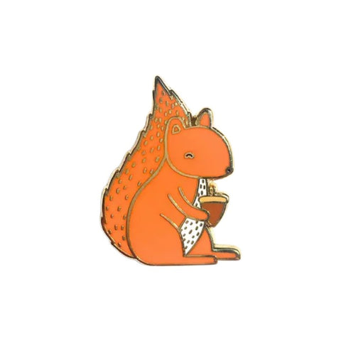Red squirrel-shaped pin on a white background