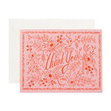 Greeting card with floral design and 'Thank You' text on a pink background