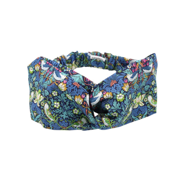 Floral patterned headband on a white background