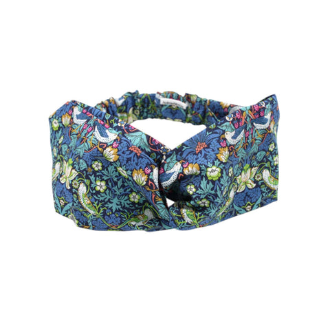 Floral patterned headband on a white background