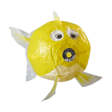 Yellow fish-shaped object with googly eyes and a black circle nose on a white background