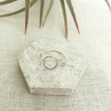 Ring made from eco silver that features a perfect circle that sits in the centre on your finger