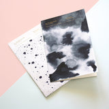 Pack of two A4 notebooks with inky cloud and Galaxy designs