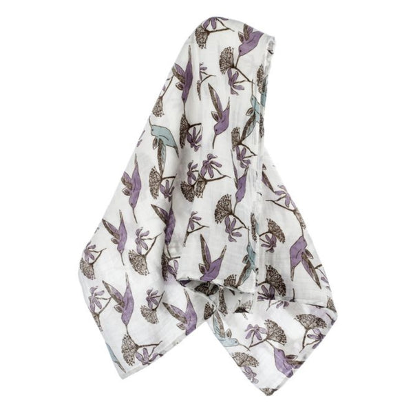 Soft organic cotton muslin cloth with humming birds and flowers epeat pattern on a white background.