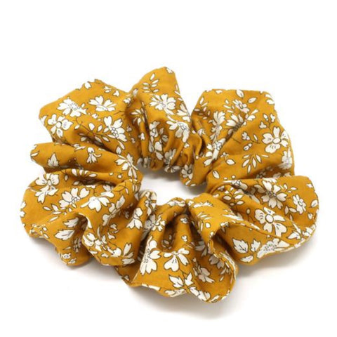 Mustard floral printed cotton hair scrunchie.