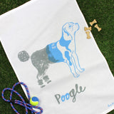 This hybrid hound screen printed tea towel features a dog that's half poodle in grey and half beagle in pale blue.