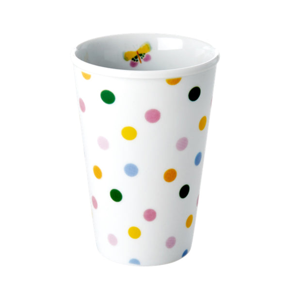 Porcelain cup with polka dot design and butterfly on the inside.