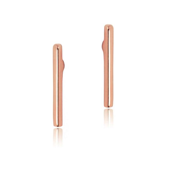 Slender thin wire stud earrings in rose gold.